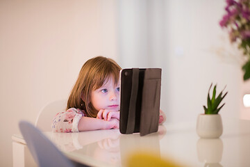 Image showing child playing with digital tablet
