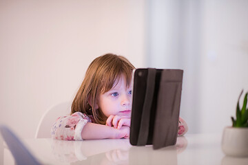 Image showing child playing with digital tablet