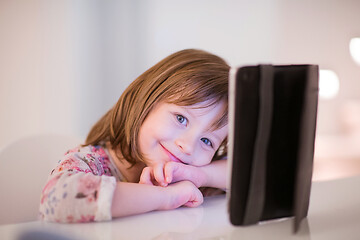 Image showing child playing with digital tablet