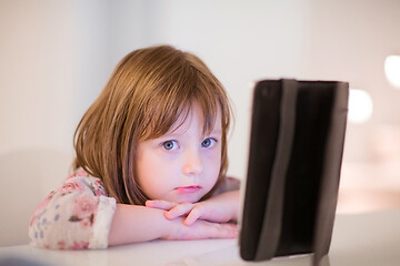 Image showing child playing with digital tablet