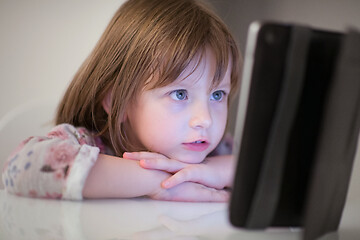 Image showing child playing with digital tablet