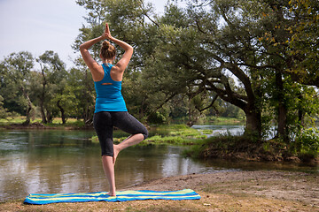 Image showing woman meditating and doing yoga exercise