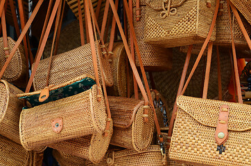 Image showing Balinese handmade rattan eco bags in a local souvenir market