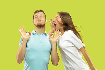 Image showing Beautiful couple isolated on green studio background