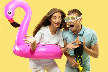 Image showing Beautiful couple isolated on yellow studio background