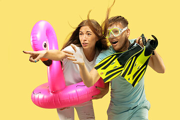 Image showing Beautiful couple isolated on yellow studio background