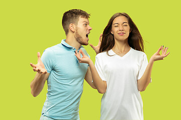 Image showing Beautiful couple isolated on green studio background