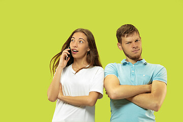 Image showing Beautiful couple isolated on green studio background