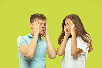 Image showing Beautiful couple isolated on green studio background