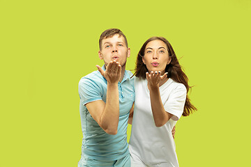 Image showing Beautiful couple isolated on green studio background