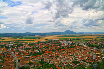 Image showing Small city landscape rounded by fields