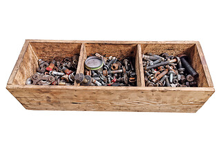 Image showing Wooden box with old metal pieces