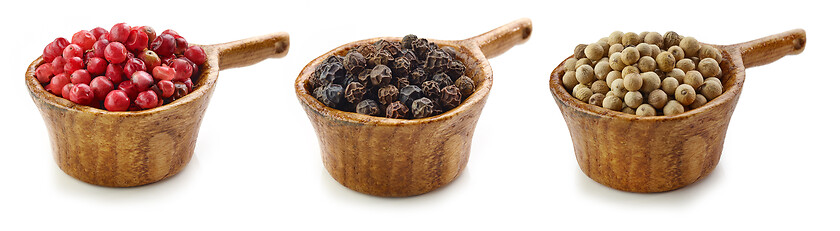 Image showing various pepper in wooden cup