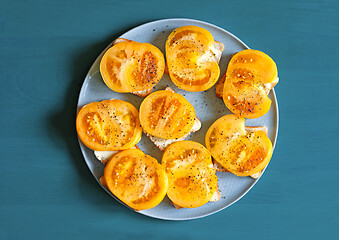 Image showing plate of sandwiches with yellow tomato