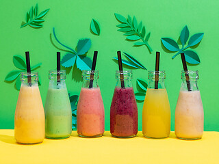 Image showing bottles of various colorful smoothies