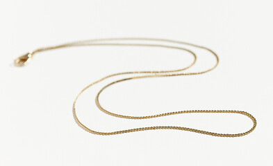 Image showing gold chain on white background