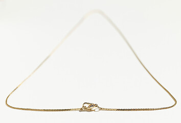 Image showing gold chain on white background