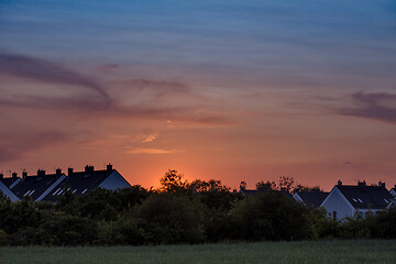 Image showing Houses and trees at sunset