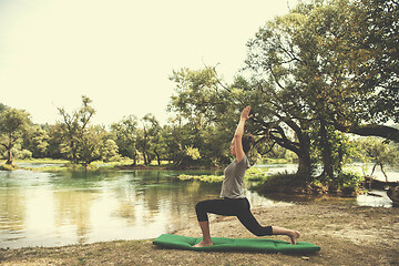 Image showing woman meditating and doing yoga exercise