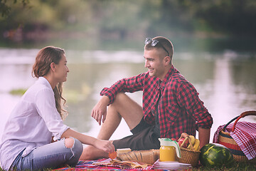 Image showing Couple in love enjoying picnic time