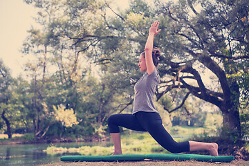 Image showing woman meditating and doing yoga exercise