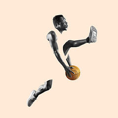 Image showing Full length portrait of a basketball player with ball