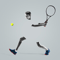 Image showing Young tennis player isolated on studio background