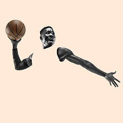 Image showing Full length portrait of a basketball player with ball