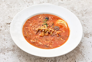 Image showing portion of tomato soup with sausage and olives