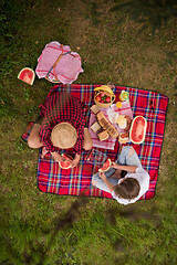 Image showing top view of couple enjoying picnic time