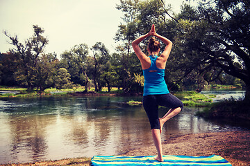 Image showing woman meditating and doing yoga exercise