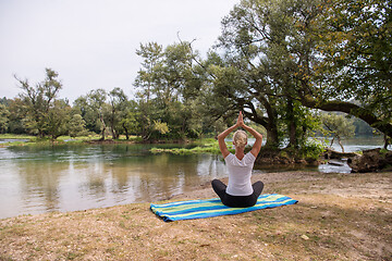 Image showing woman meditating and doing yoga exercise