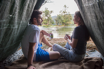 Image showing couple spending time together in straw tent