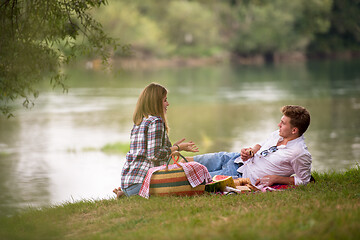 Image showing Couple in love enjoying picnic time