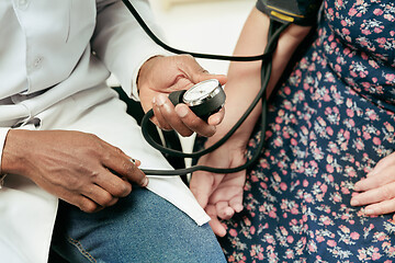 Image showing A senior woman visiting a therapist at the clinic