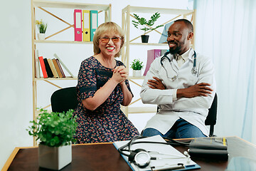 Image showing A senior woman visiting a therapist at the clinic