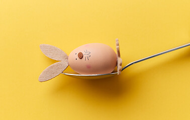 Image showing bunny shaped easter egg in a spoon