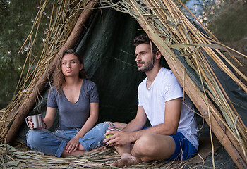 Image showing couple spending time together in straw tent