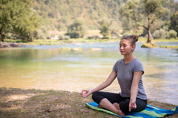 Image showing woman meditating and doing yoga exercise