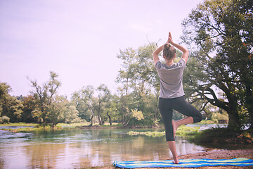 Image showing woman meditating and doing yoga exercise