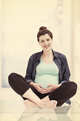 Image showing pregnant women sitting on the floor