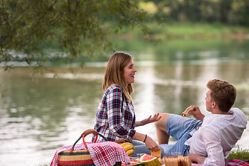 Image showing Couple in love enjoying picnic time