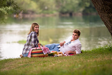 Image showing Couple in love enjoying picnic time