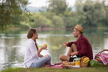 Image showing Couple in love enjoying picnic time