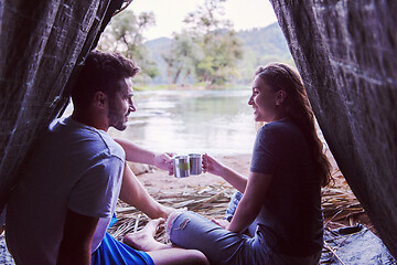 Image showing couple spending time together in straw tent