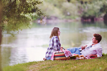 Image showing Couple in love enjoying picnic time