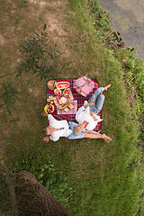 Image showing top view of couple enjoying picnic time