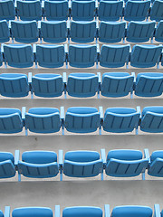 Image showing blue aligned plastic chairs