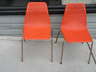 Image showing two old orange chairs