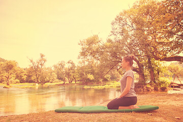 Image showing woman meditating and doing yoga exercise